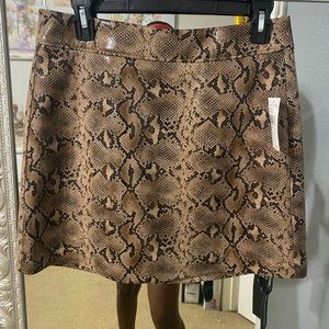 NWT tan snakeskin skirt.